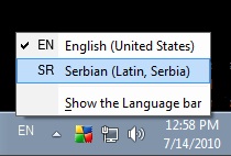 Windows 7 - Indikator aktivne tastature se nalazi u donjem desnom uglu ekrana. Aktiviranjem, birate željenu tastaturu.